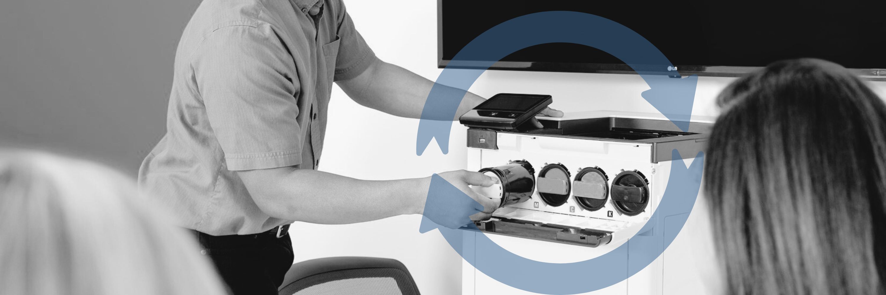 Man changing toner on a Xerox printer