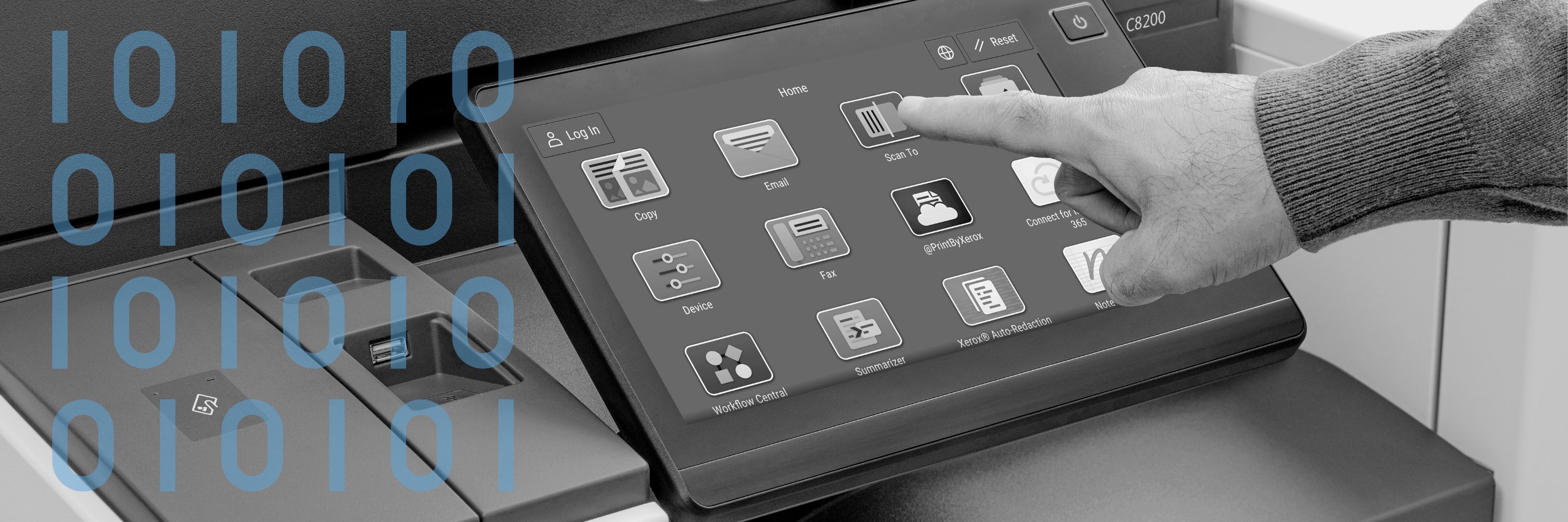 Hand touching Xerox printer touchscreen with apps