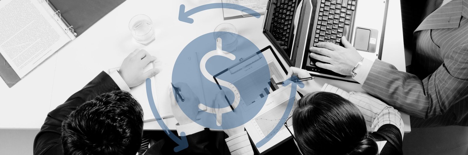 Business workers gathered around a table