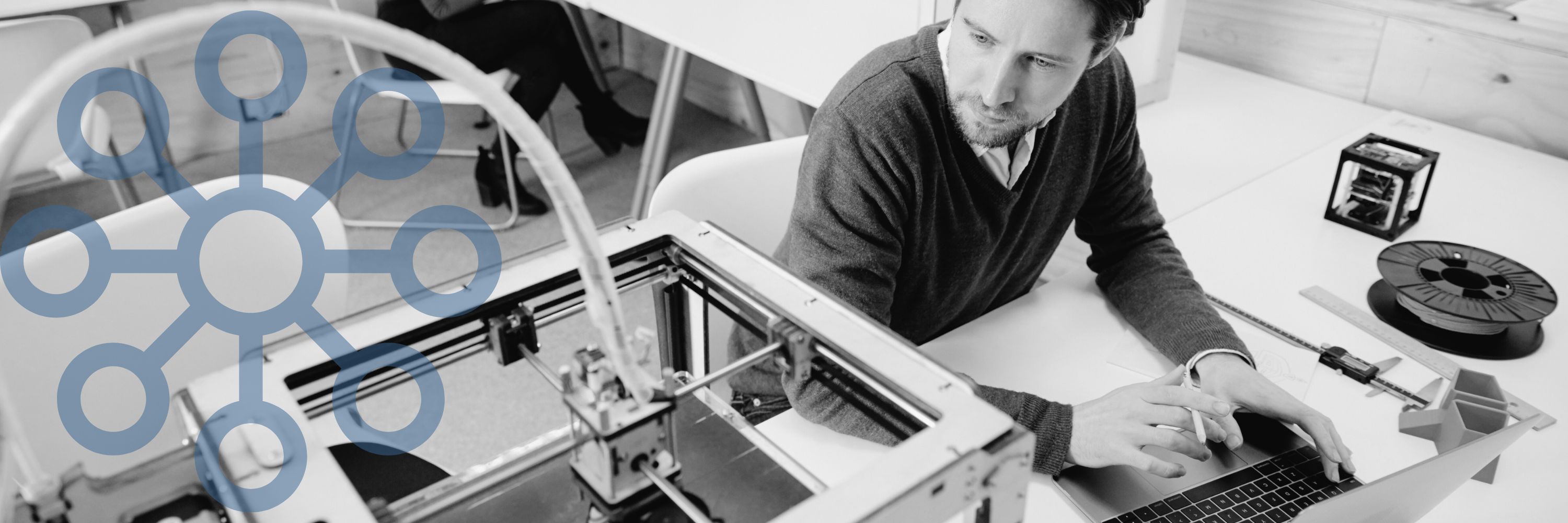 A man using a 3D printer