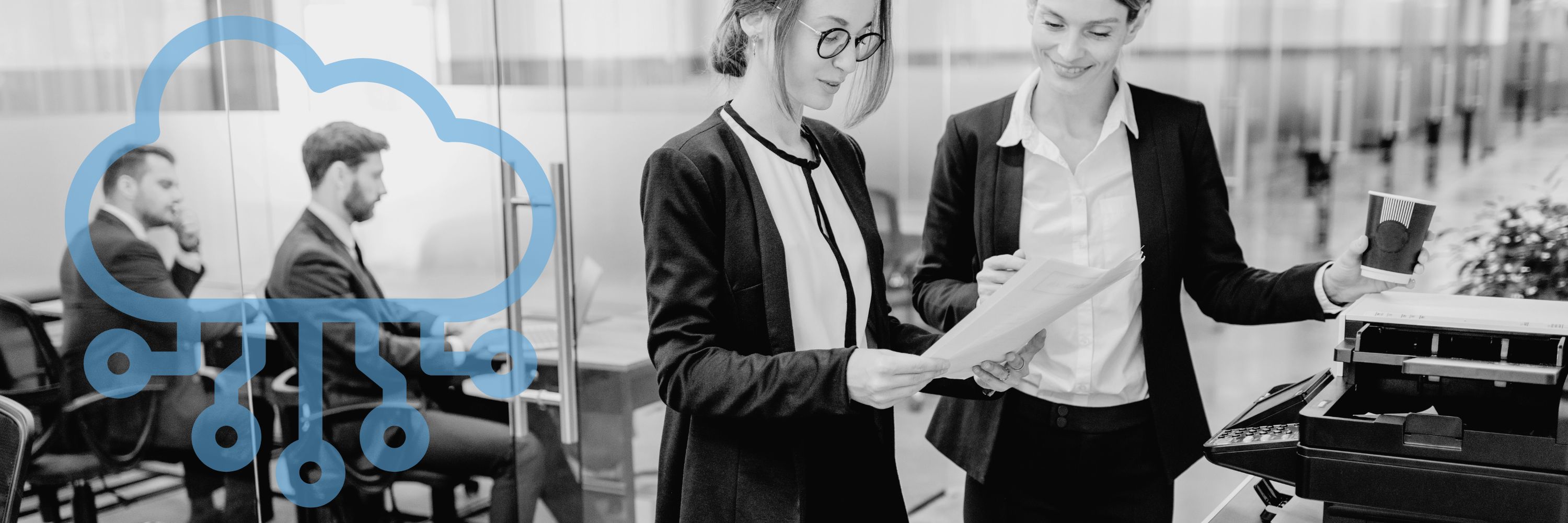 Office workers in front of a printer