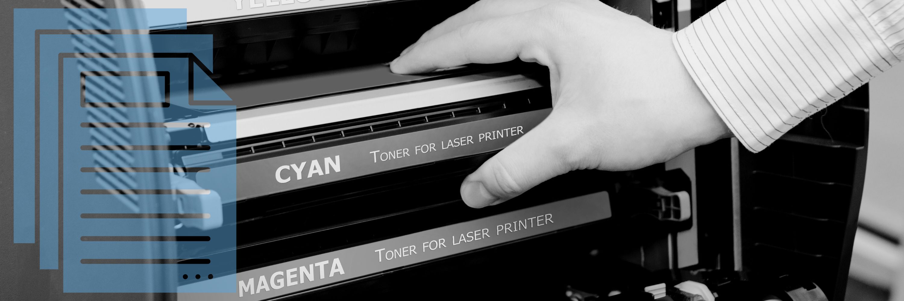 A person grabbing a toner cartridge from a laser printer