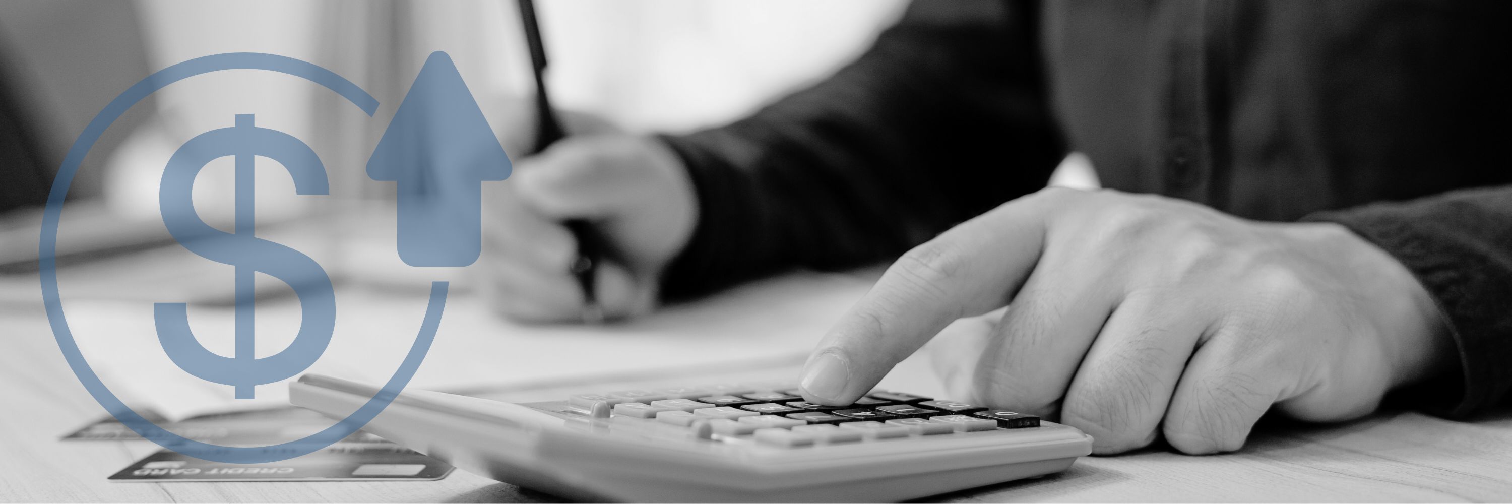 Man calculating bills with pen and calculator