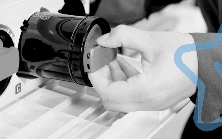 Man taking toner out of printer