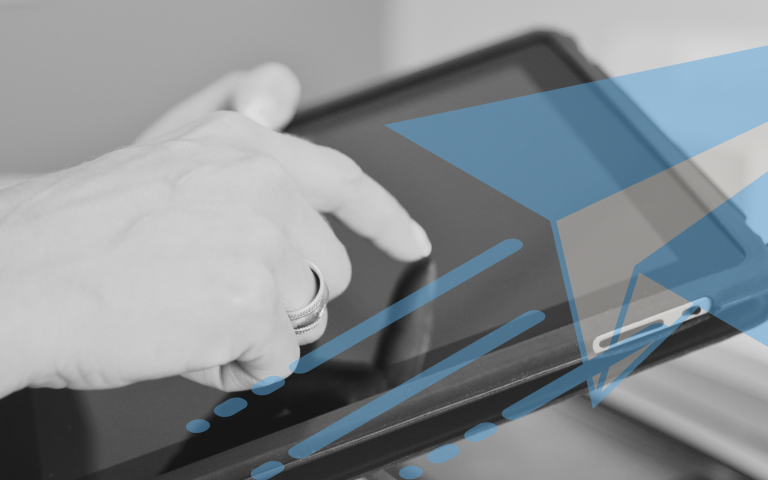 A woman uses a touchscreen to access Xerox Workflow Central.