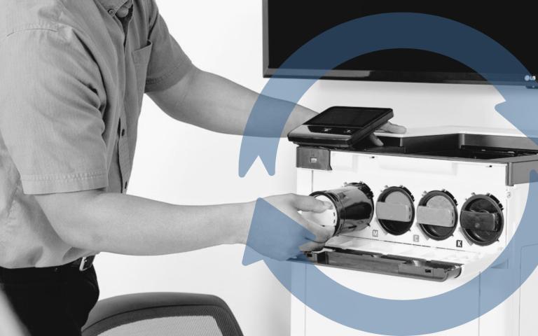 Man changing toner on a Xerox printer