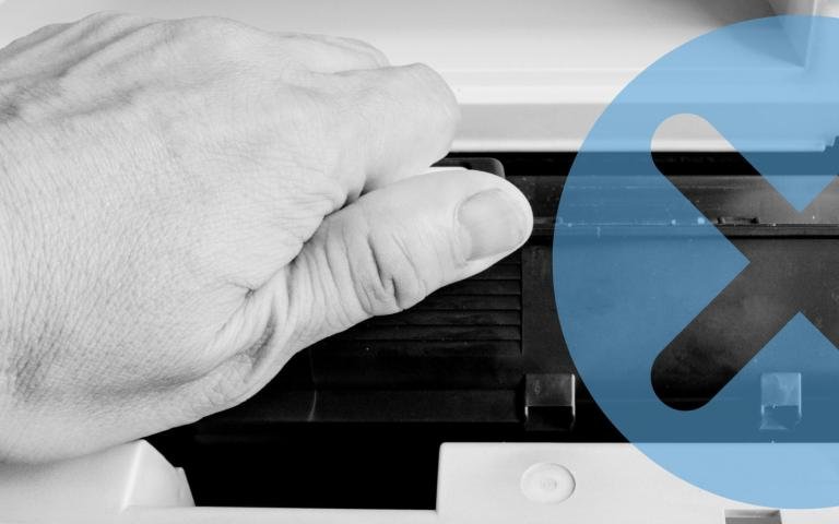 Printer technician replacing toner on a printer