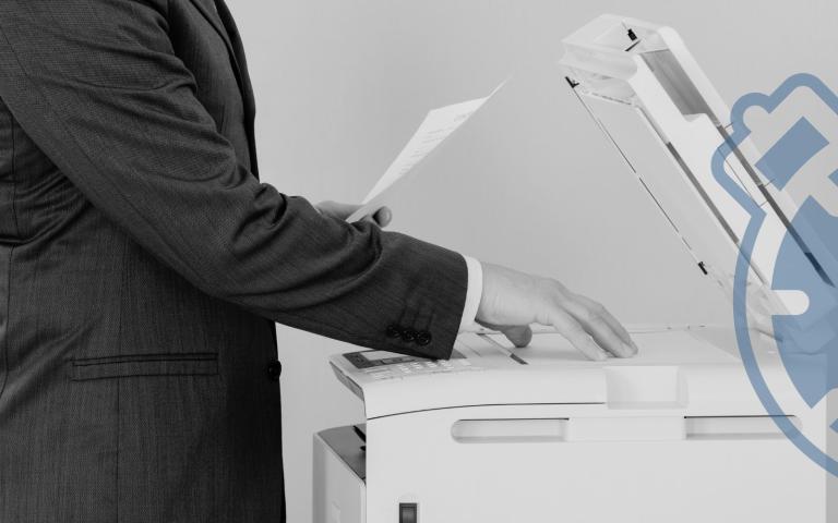 A man using a printer