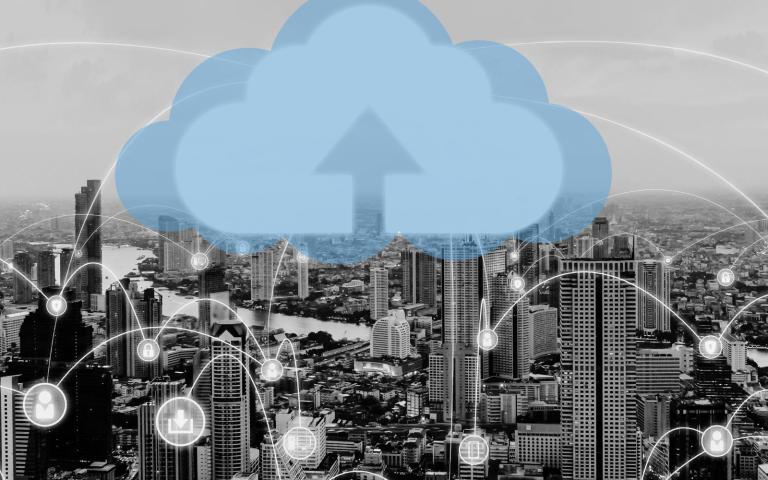 A cloud overseeing document processes over a city