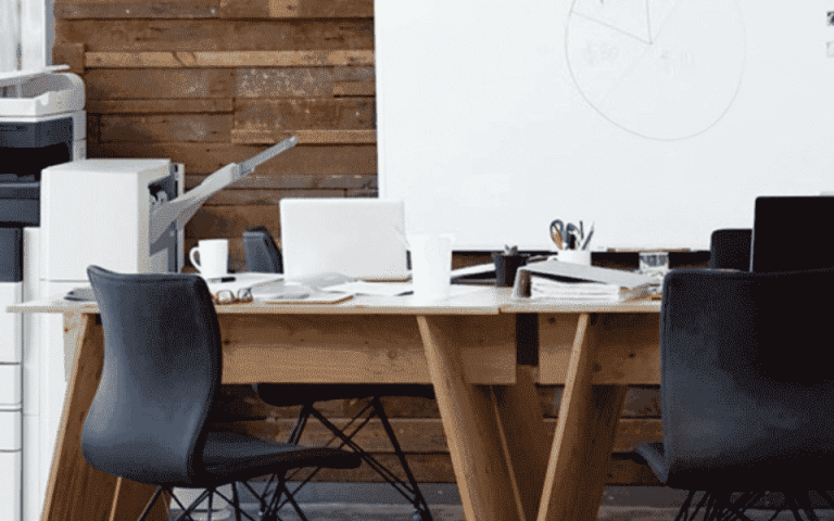 Workplace with desks next to the Xerox VersaLink B7035