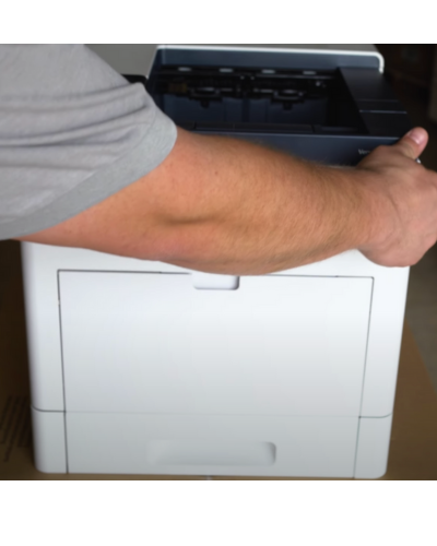 An arm reaches over to open printer's front cover 