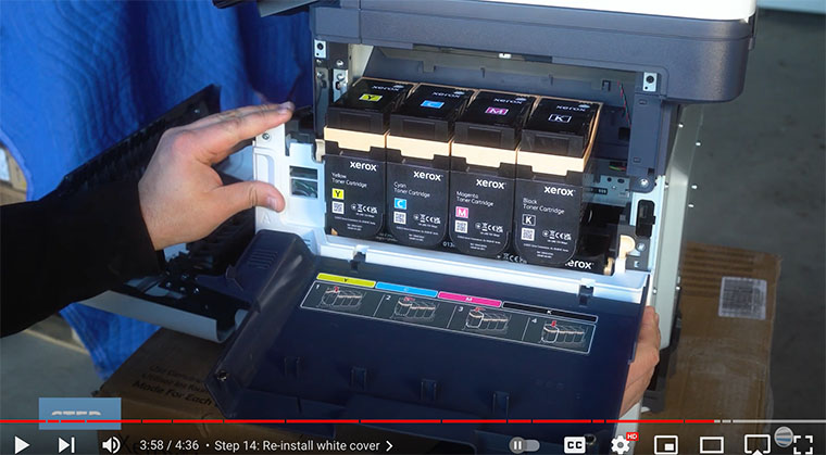 Printer technician re-installs side cover on the Xerox VersaLink C410/C415