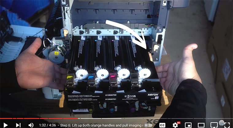 Printer technician fully removes imaging unit kit on Xerox VersaLink C410/C415
