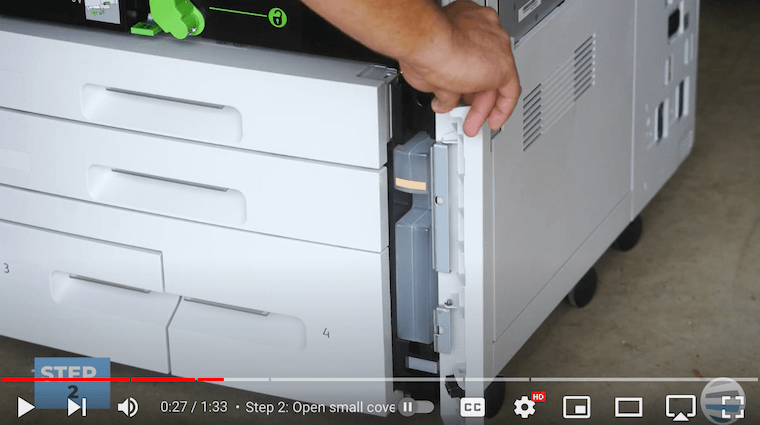 Printer technician opens cover to reveal waste toner container of Xerox PrimeLink C9065