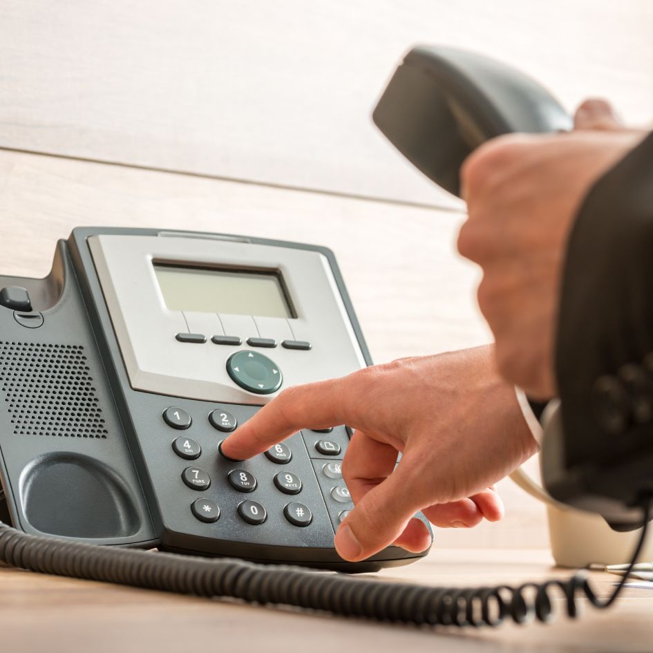 Man holding phone fax with hand