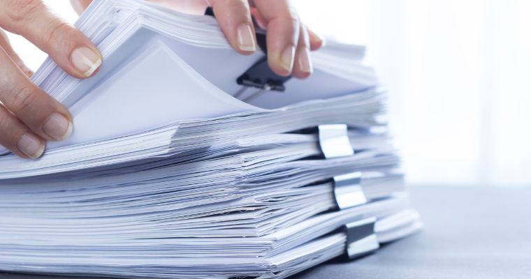 Stack of papers on office table